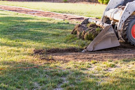 how to grade and level a yard with skid steer|grading attachment skid steer loader.